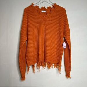 Full circle thread distressed knit sweater